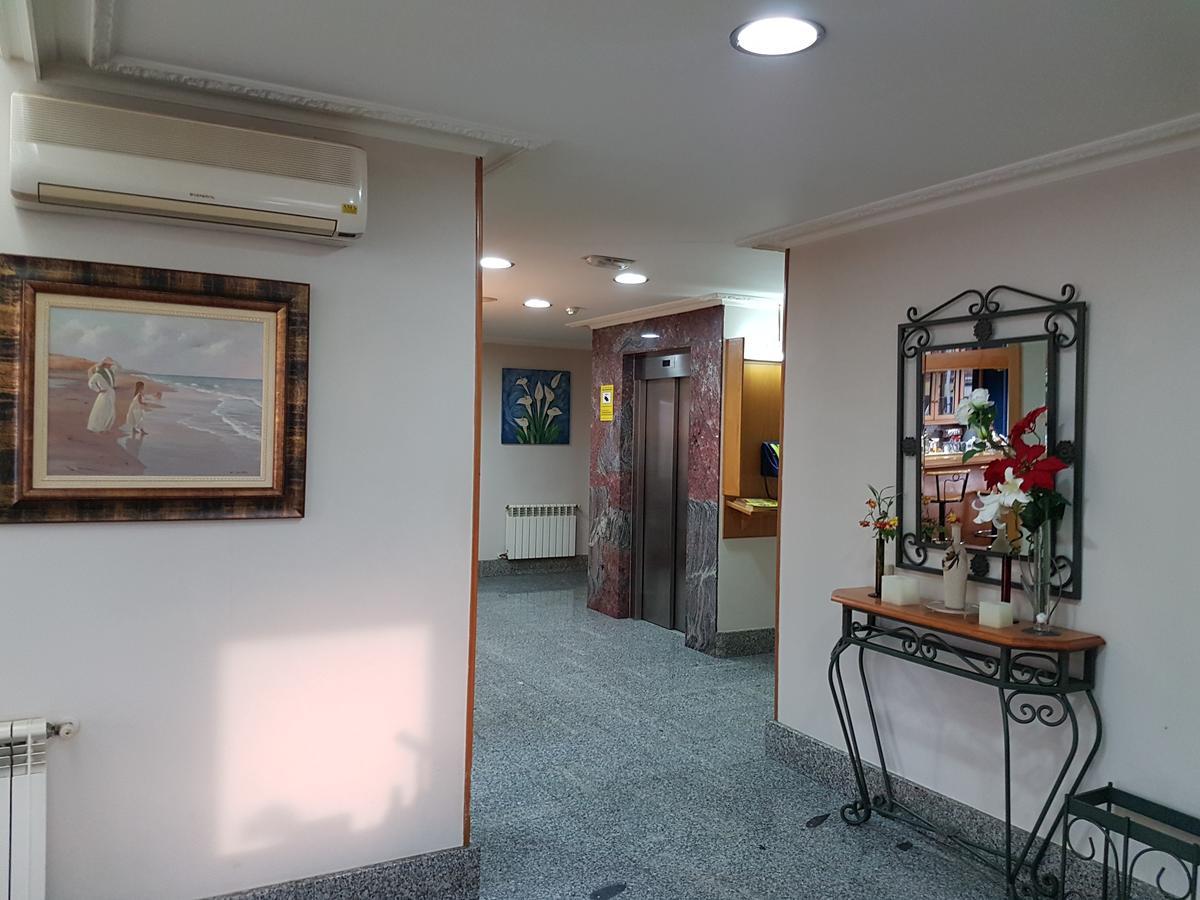 Hotel Camargo Igollo Bagian luar foto