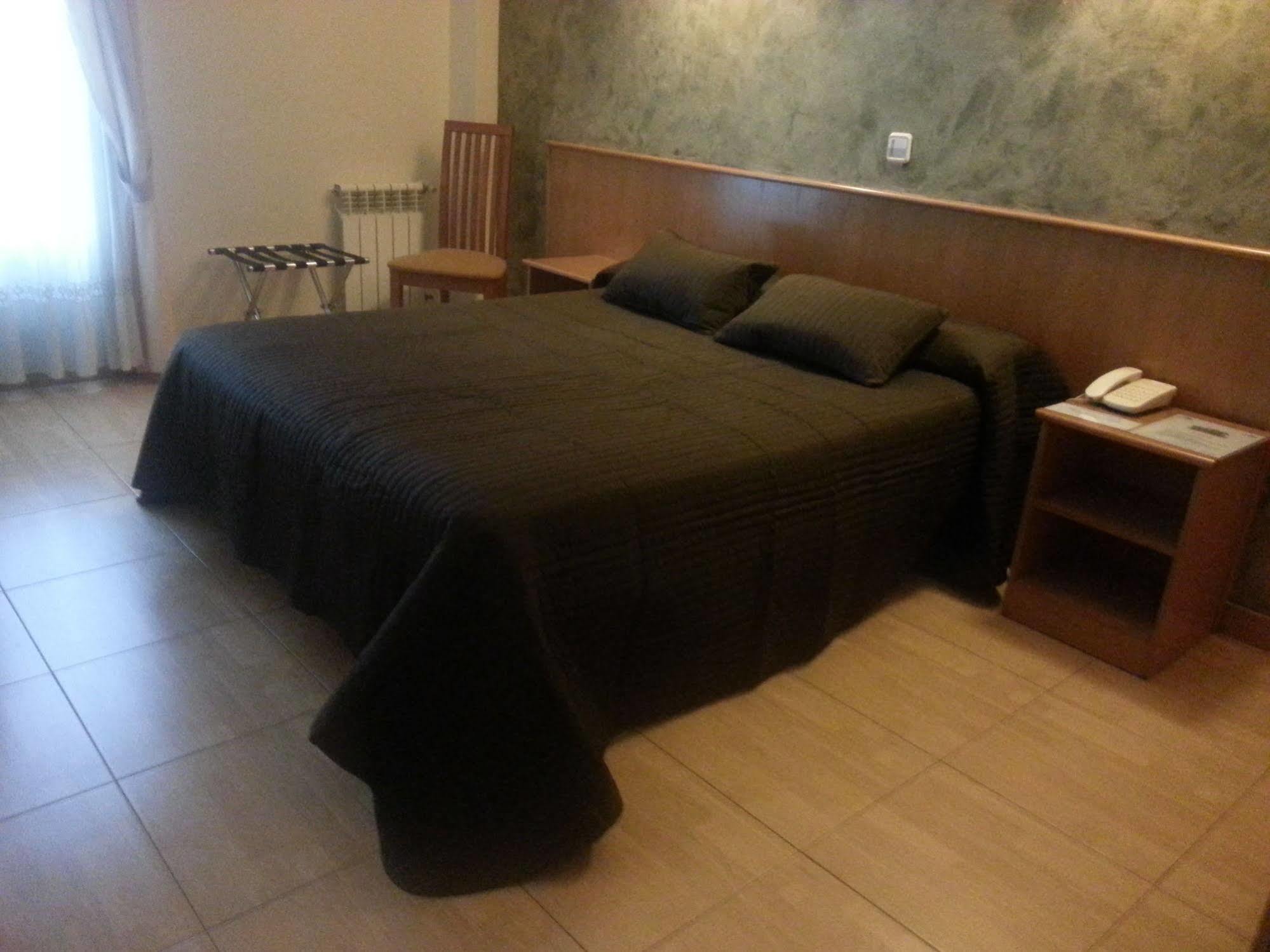 Hotel Camargo Igollo Bagian luar foto