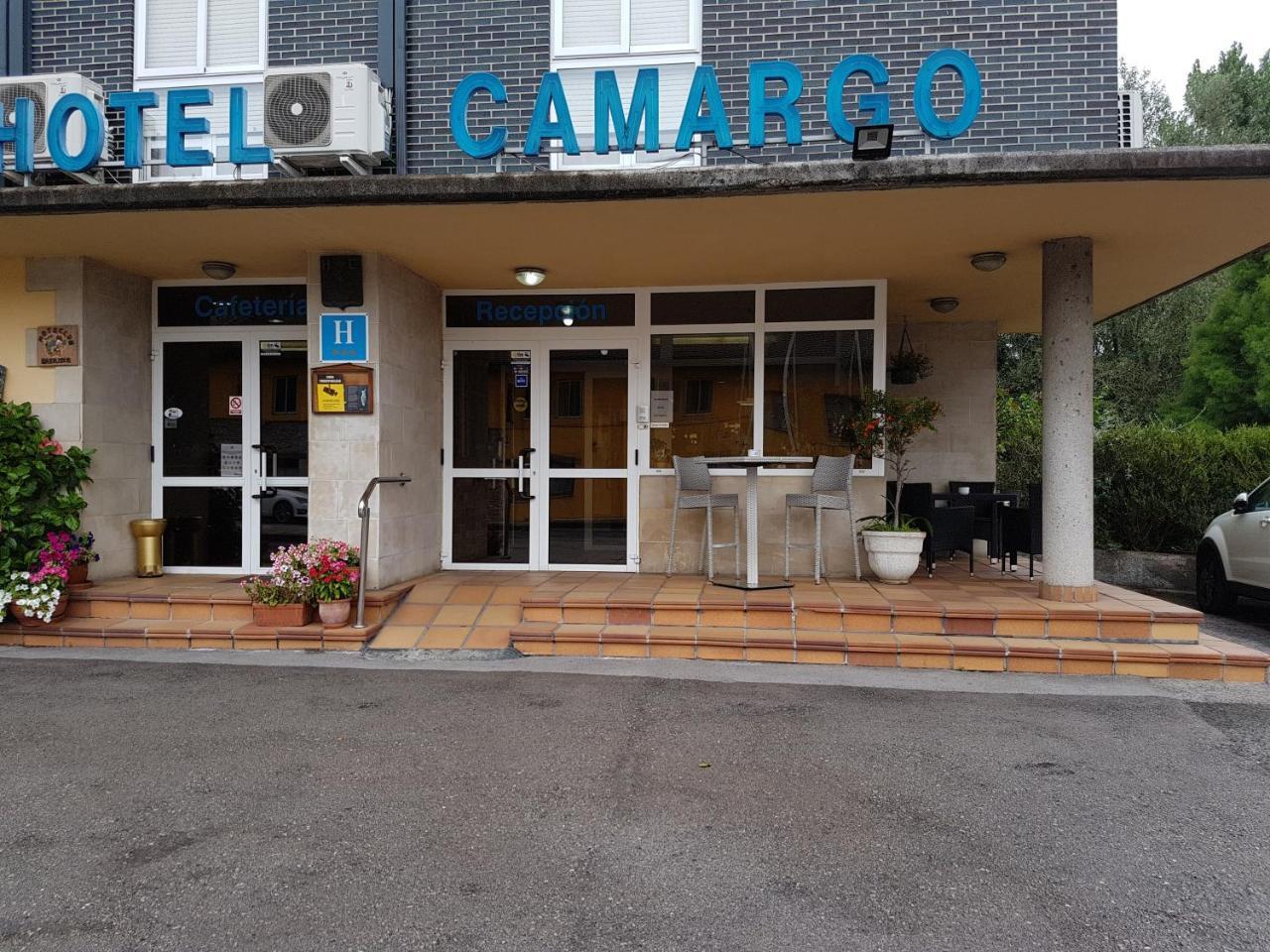 Hotel Camargo Igollo Bagian luar foto